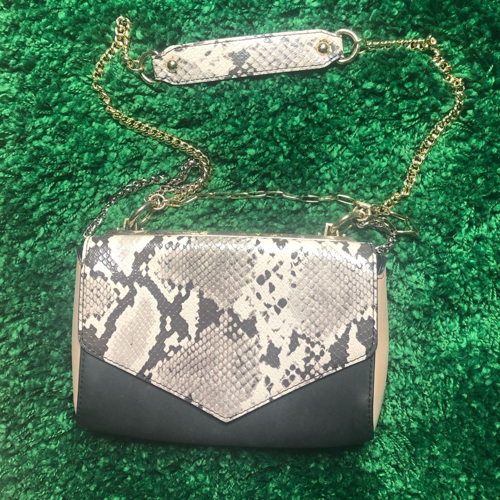 Express black, snake skin handbag